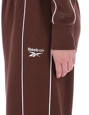 Pants acampanado Reebok con elástico para mujer