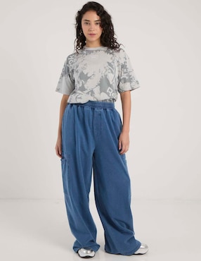 Pants acampanado Reebok con elástico para mujer